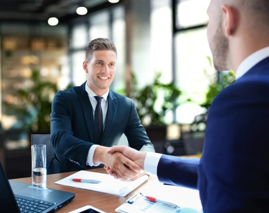 business people shaking hands